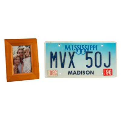 603. Jake Brigance's (Matthew McConaughey) SAAB 900 Cabrio Turbo License Plate and Framed Family Portrait ### TIME TO KILL, A (1996)