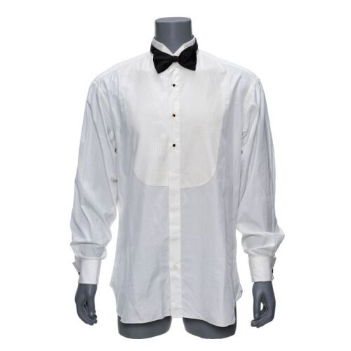 618. Harry Tasker's (Arnold Schwarzenegger) Swiss Party Shirt, Bow Tie, and Cufflinks ### TRUE LIES (1994)