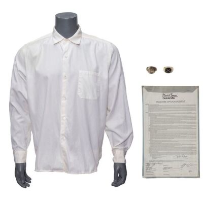 165. Joe Reaves' (Anthony LaPaglia) Dress Shirt and Pair of Rings with Screen-Matched Hand-Signed Music Town Franchise Option Agreement ### EMPIRE RECORDS (1995)