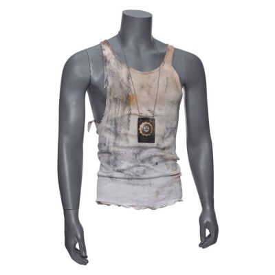 70. John McClane's (Bruce Willis) Distressed Tank-Top and Police Badge ### DIE HARD WITH A VENGEANCE (1995)