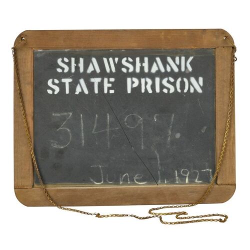 322. Planet Hollywood Collection: Ellis Boyd "Red" Redding's (Morgan Freeman) Screen- and Photo-Matched Shawshank State Prison Mugshot Slate with Laundry Leonard's (Cornell Wallace) Hand-Marked Prisoner ### THE SHAWSHANK REDEMPTION (1994)