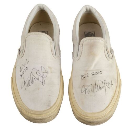 2120. Planet Hollywood Collection: Pair of Michael J. Fox-Autographed Shoes ### MICHAEL J. FOX