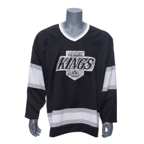2307. Planet Hollywood Auction: Team-Autographed Los Angeles Kings Jersey ### SPORTS MEMORABILIA