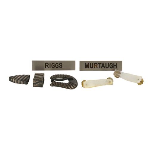 946. Mike Papac Collection: Martin Riggs' (Mel Gibson) Production-Made Belt Buckle and Name Tag with Roger Murtaugh's (Danny Glover) Name Tag ### LETHAL WEAPON 3 (1992)