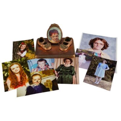 1243. Bronzed Baby Shoe Frame and 10 Photograph Shrine to Barbara Holland (Shannon Purser) ### STRANGER THINGS (T.V. SERIES, 2016 - PRESENT)