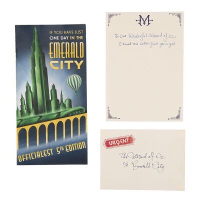 1310. Alternate Galinda (Ariana Grande) Inscribed Emerald City Tourism Guide with Madame Morrible (Michelle Yeoh) Letter and Envelope ### WICKED (2024)