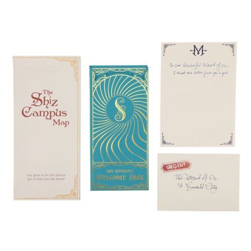 1311. Madame Morrible (Michelle Yeoh) Letter and Envelope with Shiz University Guide and Campus Map ### WICKED (2024)