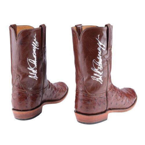 2013. Planet Hollywood Collection: Pair of Arnold Schwarzenegger-Autographed Boots ### ARNOLD SCHWARZENEGGER