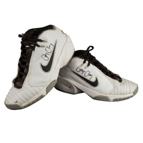 2061. Planet Hollywood Collection: George Clooney-Autographed Shoes ### GEORGE CLOONEY