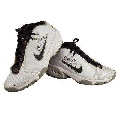 2061. Planet Hollywood Collection: George Clooney-Autographed Shoes ### GEORGE CLOONEY