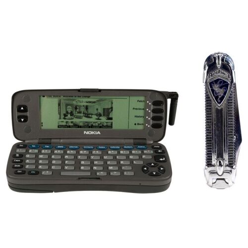1099. Planet Hollywood Collection: Simon Templar's (Val Kilmer) Pocket Knife and Nokia 9000 Communicator ### THE SAINT (1997)