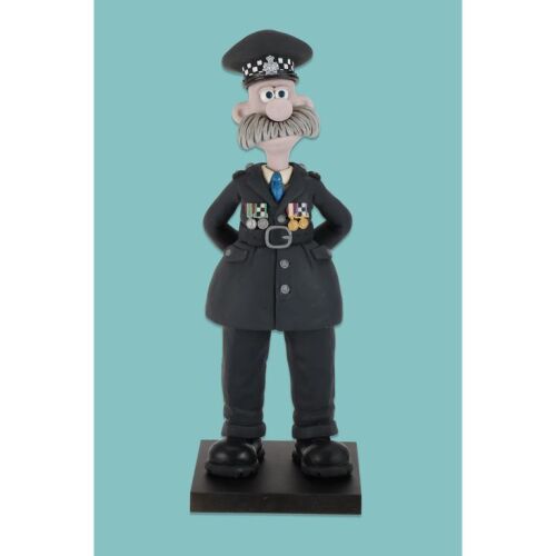 Lot # 206. CI Mackintosh with Blue Tie Stop-Motion Puppet ### WALLACE & GROMIT: VENGEANCE MOST FOWL (2024)