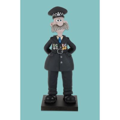 Lot # 206. CI Mackintosh with Blue Tie Stop-Motion Puppet ### WALLACE & GROMIT: VENGEANCE MOST FOWL (2024)