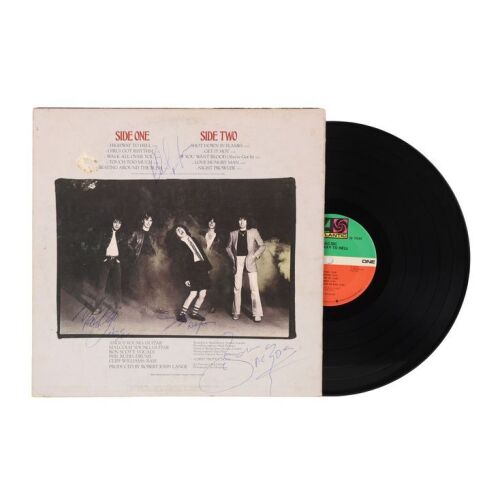 Lot # 7. Bon Scott, Malcolm Young, Angus Young and Phil Rudd-Autographed Highway To Hell LP ### AC/DC