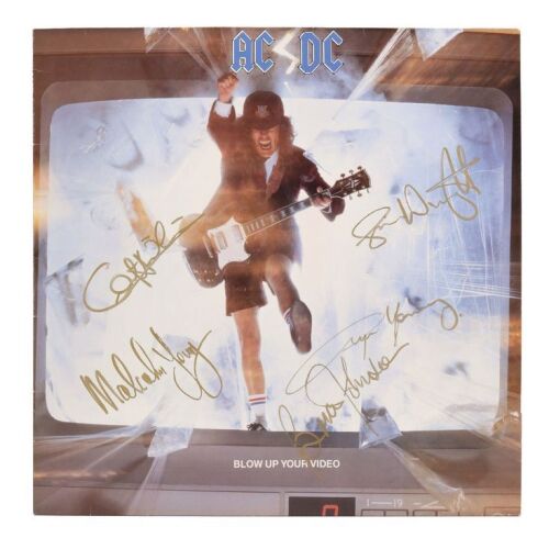 Lot # 8. Brian Johnson, Angus Young, Malcolm Young, Cliff Williams, Simon Wright-Autographed Blow Up Your Video LP Sleeve, 1988 ### AC/DC