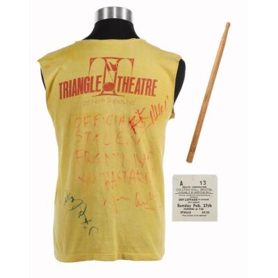 Lot # 79. Joe Elliot, Steve Clark, and Rick Allen-Autographed T-Shirt, Worn In The Rock of Ages Music Video, 1983 ### DEF LEPPARD