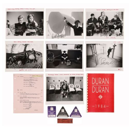 Lot # 86. Denis O'Regan Collection: Seven Band-Autographed Vintage Prints, "Sing Blue Silver" Tour Call Sheet Booklet, Three Tour Passes, One Madison Square Garden First-Performance Concert Ticket and Miami Vice Production Script ### DURAN DURAN