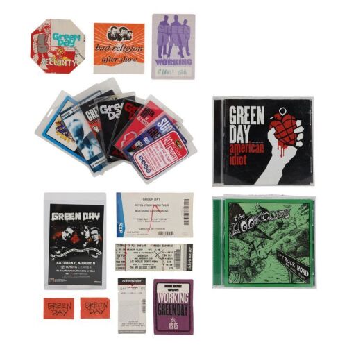Lot # 102. Billie Joe Armstrong, Mike Dirnt and Tre Cool-Autographed 21st Century Breakdown Poster with Autographed American Idiot Poster and Collection of Green Day Ephemera ### GREEN DAY