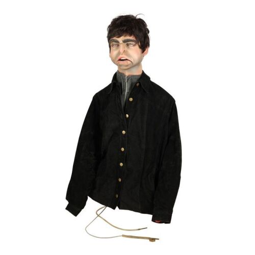 Lot # 180. Spitting Image Noel Gallagher Puppet ### OASIS