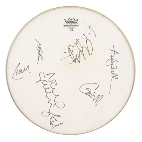 Lot # 214. Noel Gallagher, Liam Gallagher, Alan White, Gem Archer, Andy Bell and Mike Rowe- Autographed Stage-Used Drumskin from Standing on the Shoulder of Giants Tour ### OASIS