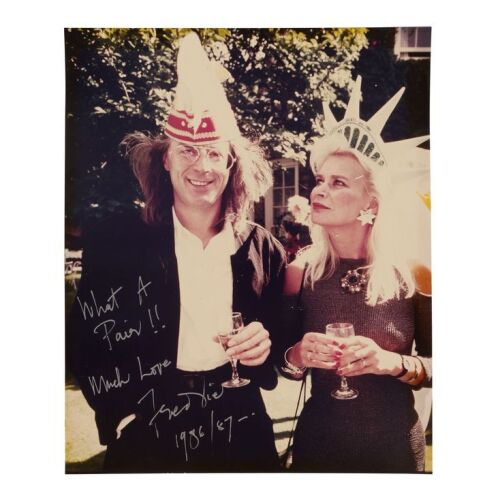 Lot # 294. The Reinhold Mack Collection: Freddie Mercury-Autographed Reinhold and Ingrid Mack Hat Party Photograph ### QUEEN