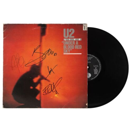Lot # 376. Bono, The Edge, Adam Clayton, and Larry Mullen Jr.-Autographed Under A Blood Red Sky LP ### U2