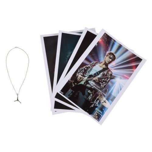 Lot # 129. Pete Doherty Stage-Worn Silver Chain Crucifix ### LIBERTINES, THE