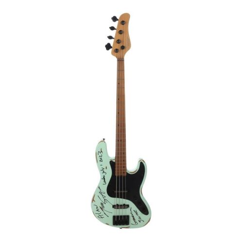 Lot # 155. Nikki Sixx's Photo-Matched Autographed and Inscribed Stage-Used Schecter J-4 Bass Guitar ### MOTLEY CRUE