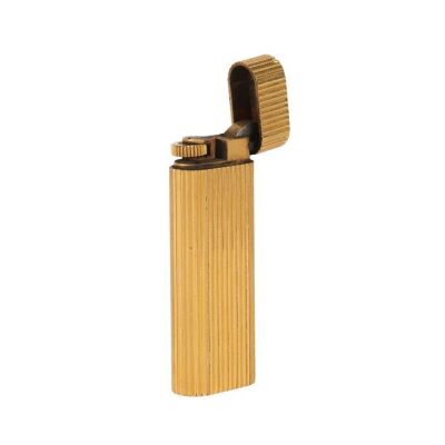 Lot # 278. The Reinhold Mack Collection: Freddie Mercury-Gifted Gold-Plated Cartier Lighter ### FREDDIE MERCURY