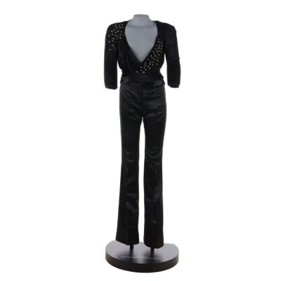 Lot # 303. Freddie Mercury's Screen-And-Photo-Matched Stage-Worn Black Wrap-Around Embellished Top and Flared Trousers Worn During Sheer Heart Attack Tour ### QUEEN