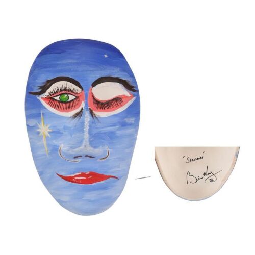 Lot # 322. Brian May-Autographed and Hand-Painted Prince's Trust Mask and Accompanying Catalogue, 1996 ### QUEEN