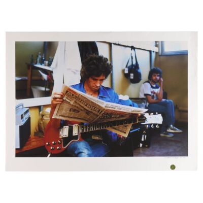 Lot # 344. The Denis O'Regan Collection: Limited Edition Keith Richards With Guitar and Reading Newspaper Backstage Fine Art Print, Turin, 1982 ### ROLLING STONES, THE