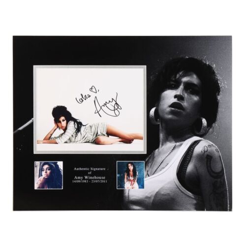 Lot # 401. Amy Winehouse-Autographed Photograph in Mount ### AMY WINEHOUSE