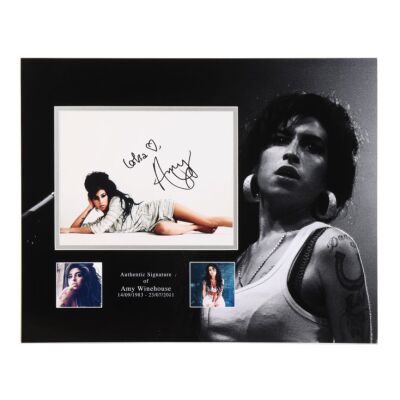Lot # 401. Amy Winehouse-Autographed Photograph in Mount ### AMY WINEHOUSE