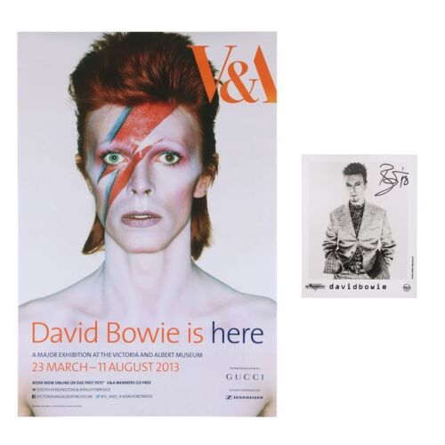 Lot # 469. David Bowie-Autographed Photograph and V&A Exhibition Poster ### DAVID BOWIE