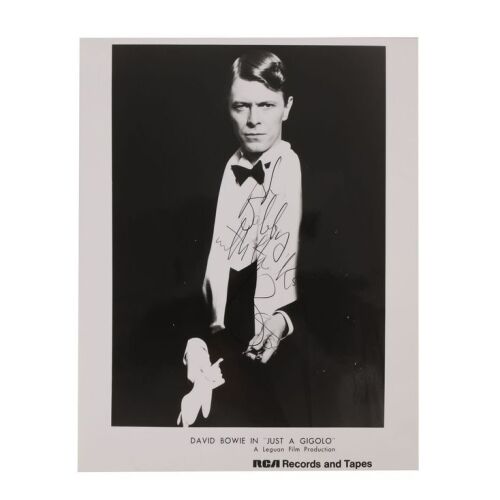 Lot # 470. David Bowie-Autographed Photo ### DAVID BOWIE