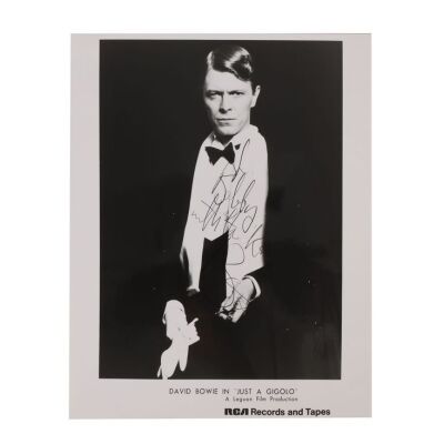 Lot # 470. David Bowie-Autographed Photo ### DAVID BOWIE