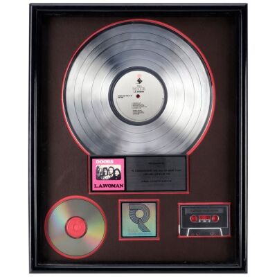 Lot # 480. L.A. Woman Platinum Disc Award Presented to John Lassman ### DOORS, THE