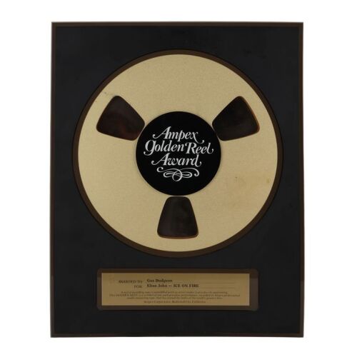 Lot # 492. Golden Reel Award Presented to Producer Gus Dudgeon for Elton John&rsquo;s Ice on Fire ### ELTON JOHN