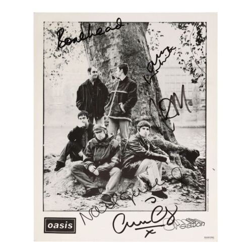 Lot # 597. Liam Gallagher, Noel Gallagher, Paul "Bonehead" Arthurs, Paul "Guigsy" McGuigan and Alan White-Autographed Publicity Photo ### OASIS