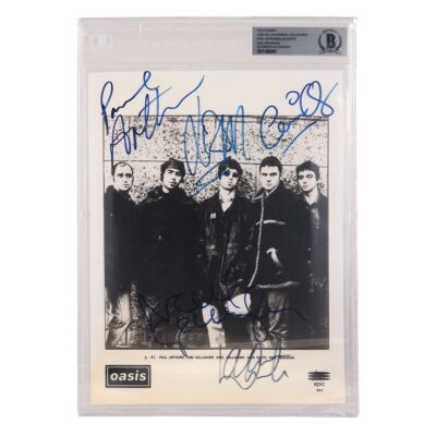 Lot # 603. Liam Gallagher, Paul Arthurs, Noel Gallagher, Paul McGuigan, and Alan White-Autographed Photo ### OASIS