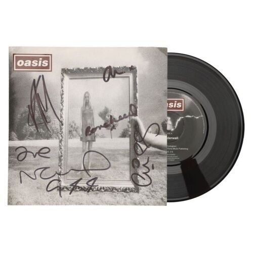 Lot # 608. Band-Autographed 'Wonderwall' 7" Vinyl ### OASIS
