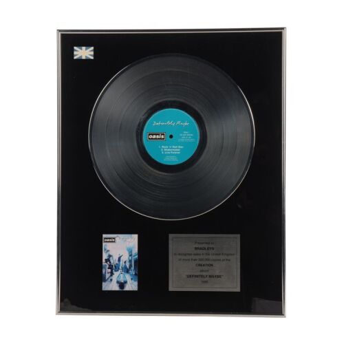 Lot # 624. Definitely Maybe Platinum Disc Award Presented to Bradleys ### OASIS