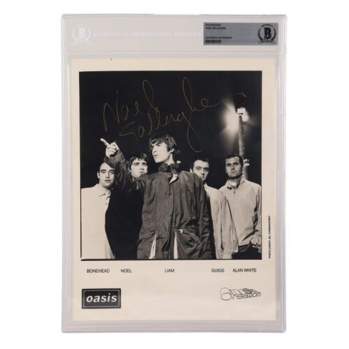 Lot # 630. Noel Gallagher-Autographed Photo ### OASIS