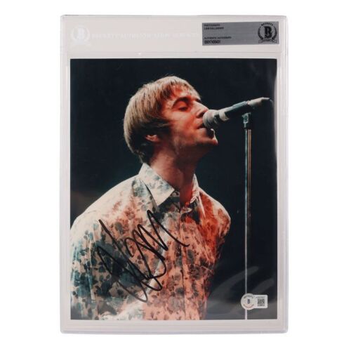 Lot # 631. Liam Gallagher-Autographed Oasis Photograph ### OASIS