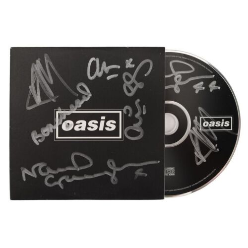 Lot # 634. Noel Gallagher, Liam Gallagher, Paul McGuigan, Paul "Bonehead" Arthurs and Alan White-Autographed Be Here Now Promo CD Album ### OASIS