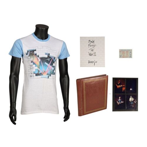 Lot # 657. Original T-Shirt, Programme, and Ticket, with Album Of Photos from 'The Wall', London, 6th August 1980 ### PINK FLOYD