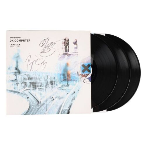 Lot # 734. Tom Yorke, Jonny Greenwood, Colin Greenwood, Philip Selway and Ed O'Brien-Autographed Ok Computer LP ### RADIOHEAD