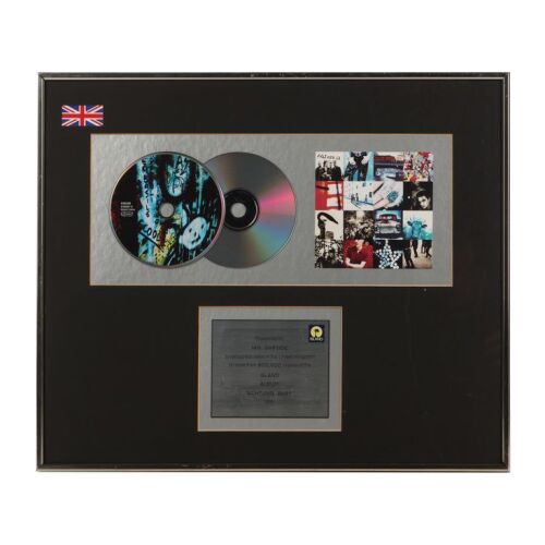 Lot # 796. Achtung Baby Double-Platinum Disc Award ### U2