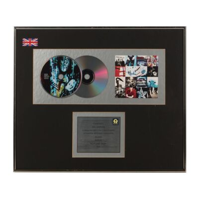 Lot # 796. Achtung Baby Double-Platinum Disc Award ### U2